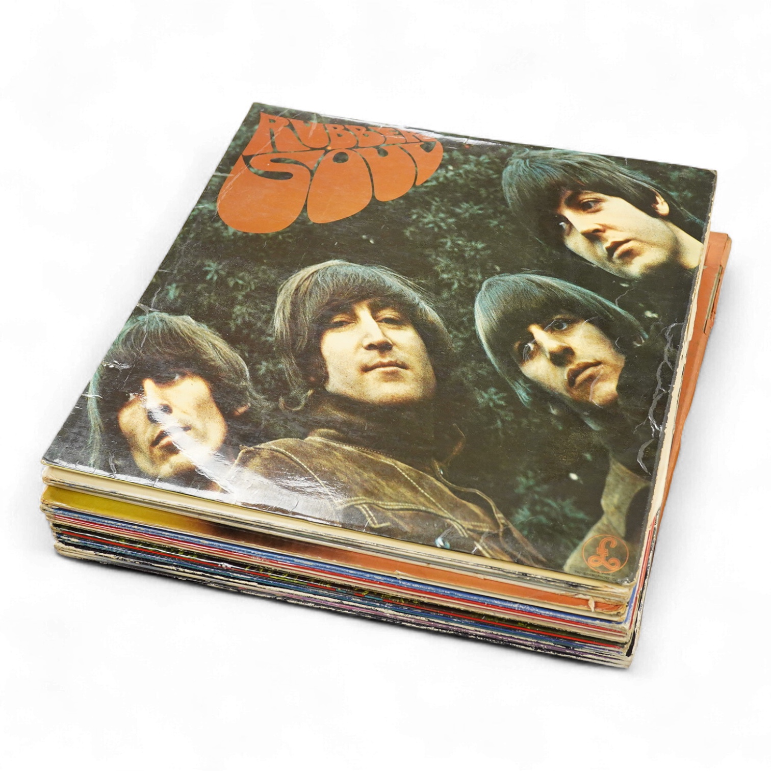 Fourteen The Beatles related LP record albums, including; Rubber Soul, The Beatles at the Hollywood Bowl, With The Beatles, Beatles For Sale, Sgt. Pepper, Revolver, McCartney II, Wings Over America, the Concert for Bangl